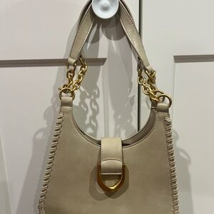 Elegant Cream Handbag with Gold Accents